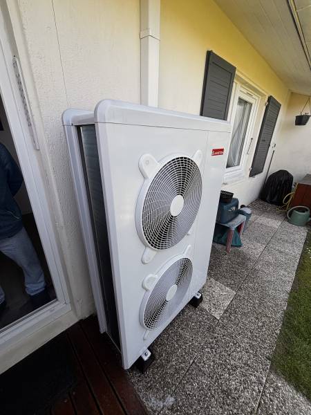 Confort de chauffage dans une maison aux Loges après un projet de PAC air/eau bien dimensionné.